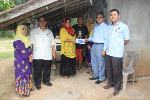 MAJLIS PENYAMPAIAN BANTUAN SUMBANGAN MAJLIS ORANG-ORANG BESAR NEGERI KELANTAN BAGI JAJAHAN PASIR MAS