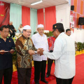 Majlis Penyerahan Surat Hakmilik Tanah kepada Peneroka-Peneroka Felda Kemahang 2&3
