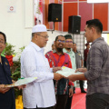 Majlis Penyerahan Surat Hakmilik Tanah kepada Peneroka-Peneroka Felda Kemahang 2&3
