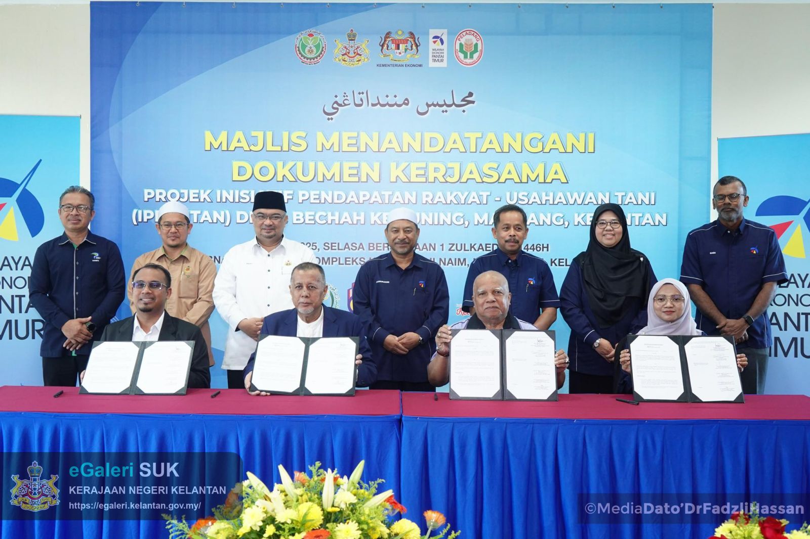 majlis-menandatangani-dokumen-kerjasama-bagi-projek-inisiatif-pendapatan-rakyat-usahawan-tani-iprintan-di-kg-bechah-kemuning-machang-1.jpg