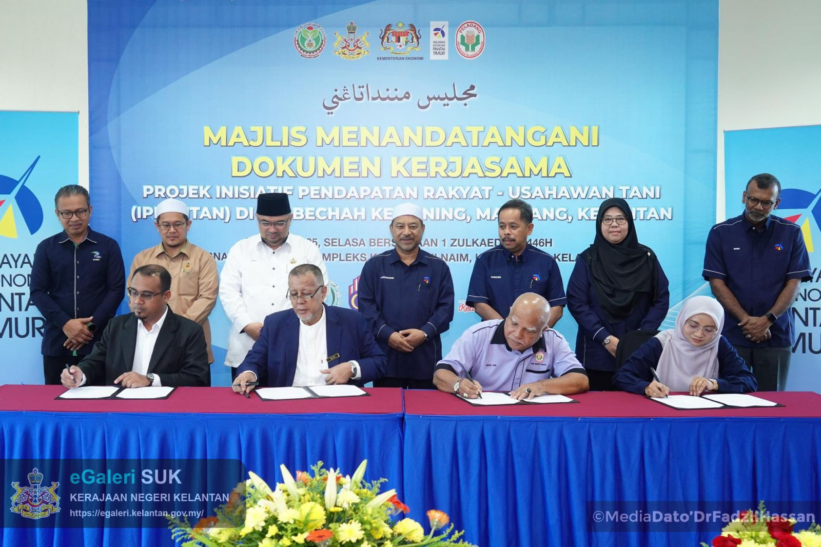majlis-menandatangani-dokumen-kerjasama-bagi-projek-inisiatif-pendapatan-rakyat-usahawan-tani-iprintan-di-kg-bechah-kemuning-machang-3.jpg
