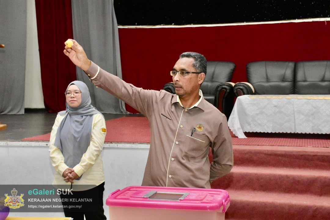 majlis-pengundian-kerjakerja-penyelenggaraan-jalan-marris-pejabat-tanah-dan-jajahan-pasir-puteh-bil-2026-15.jpg