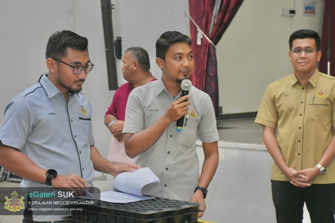 majlis-pengundian-kerjakerja-penyelenggaraan-jalan-marris-pejabat-tanah-dan-jajahan-pasir-puteh-bil-2026-22.jpg