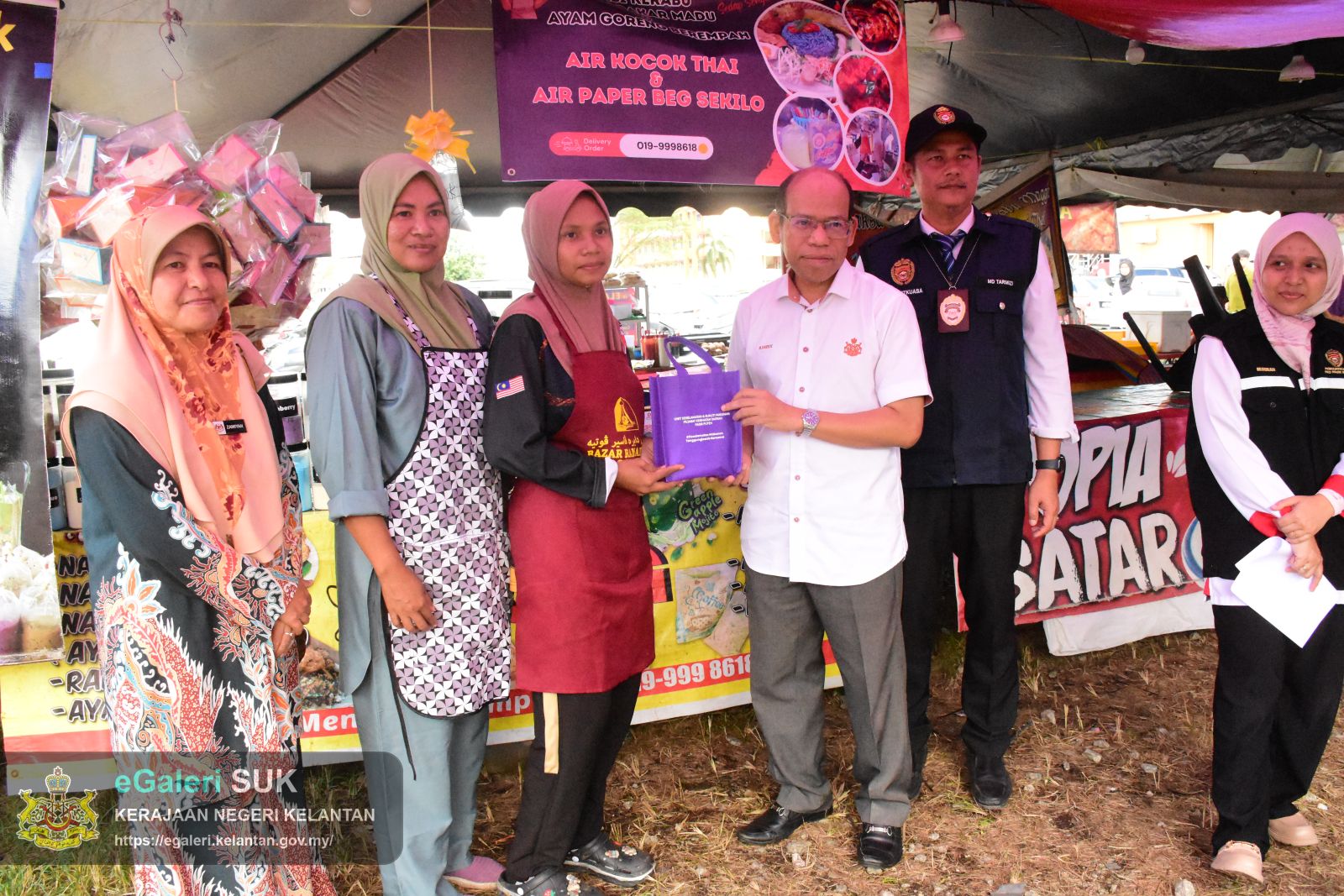 bazar-ramadan-pasir-puteh-astaka--perasmian-dan-lawatan-ke-tapak-bazar-ramadan-bagi-program-walkabout-ramadan-2025-21.JPG