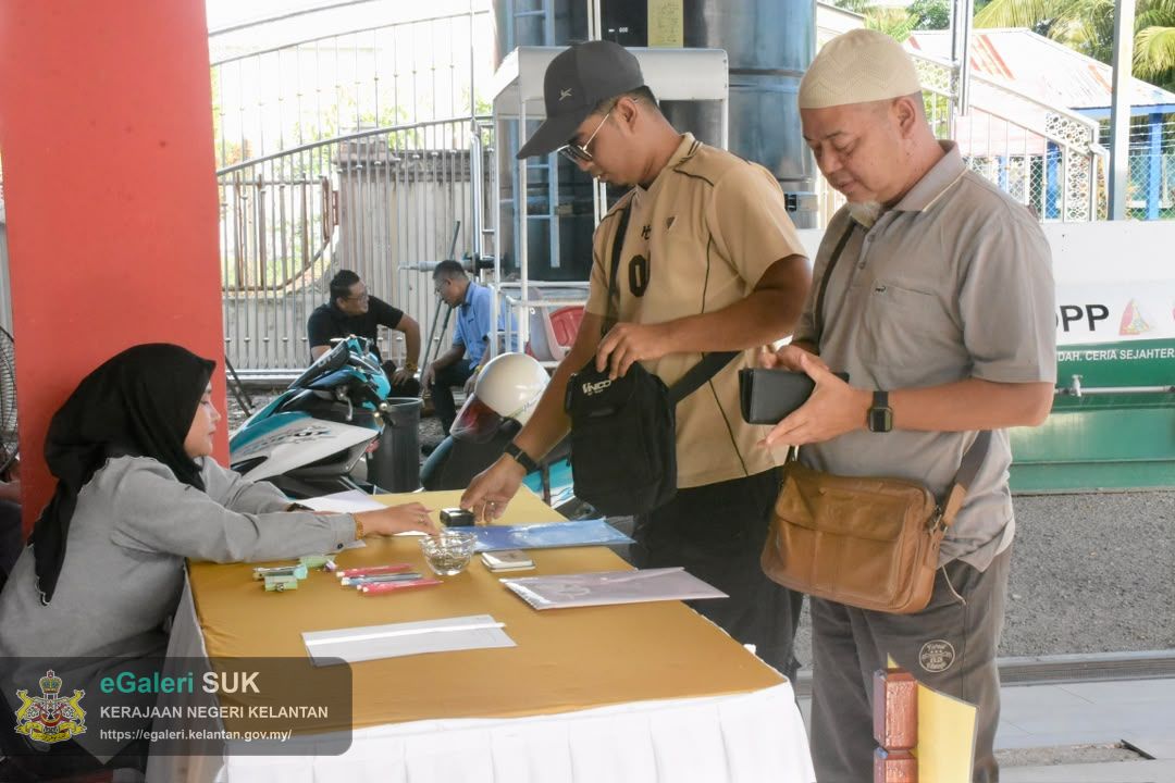 majlis-pengundian-kerjakerja-penyelenggaraan-jalan-marris-pejabat-tanah-dan-jajahan-pasir-puteh-bil-2026-26.jpg