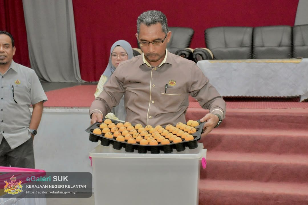 majlis-pengundian-kerjakerja-penyelenggaraan-jalan-marris-pejabat-tanah-dan-jajahan-pasir-puteh-bil-2026-9.jpg
