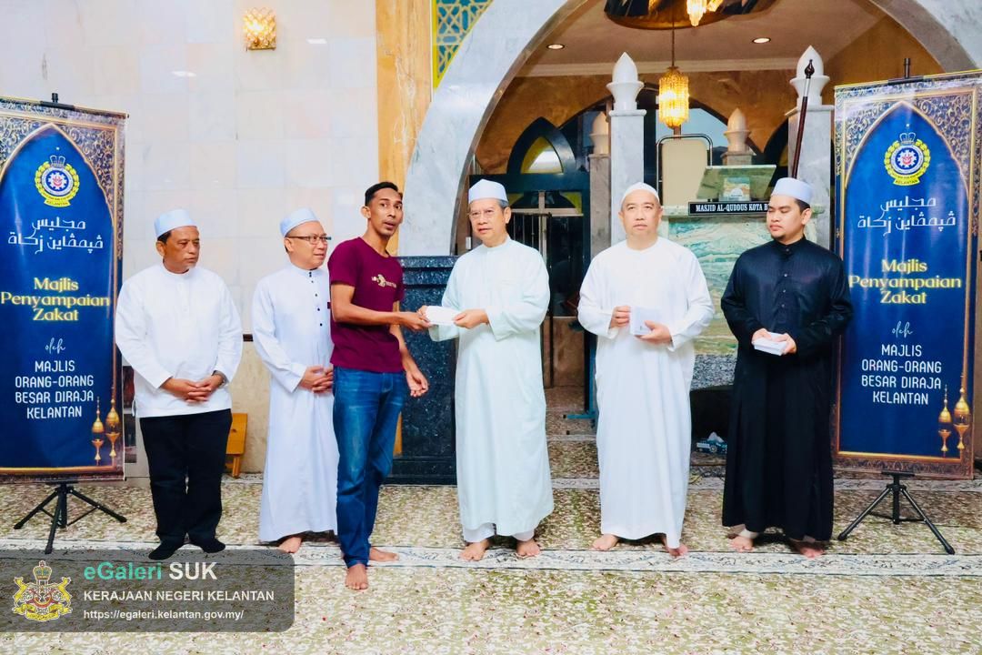 majlis-penyerahan-zakat-melalui-mob-di-masjid-alquddus-mukim-paya-bemban-kota-bharu-18.jpg